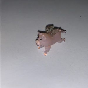 small glass pig with wings